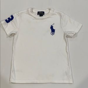White Polo t-shirt, with blue logo.
